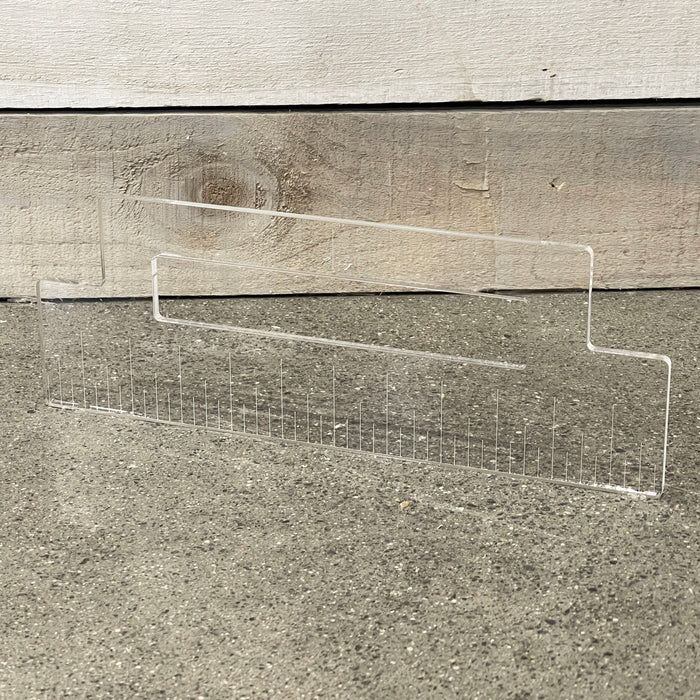 router template for rectangular pull grip with scored lines and drilled corners